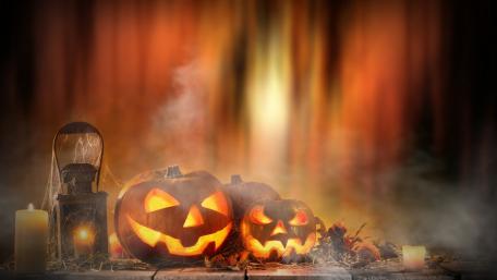 Spooktacular Halloween Night Decorated with Jack o' Lanterns wallpaper