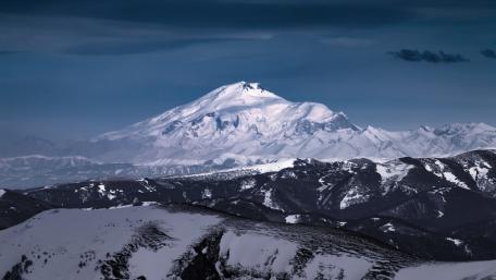 Majestic Snow-Capped Peaks of Nature's Glory wallpaper