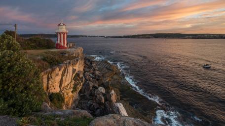 Radiant Lighthouse at Sunset wallpaper