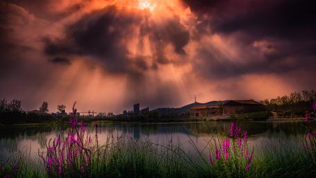 Purple Sky and Sunlit Clouds Over Lake Landscape wallpaper