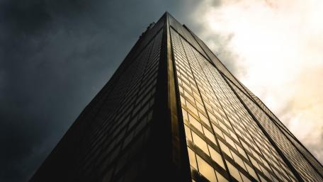 Skyscraper Majesty Under Dramatic Skies wallpaper
