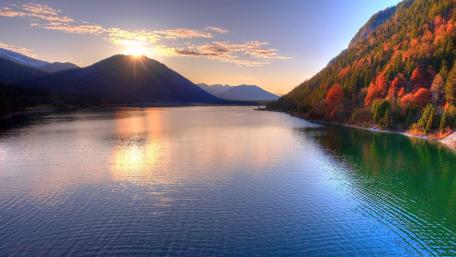 Autumn Sunrise Over Tranquil Lake wallpaper