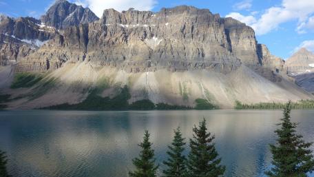 Majestic Mountains Reflected in Tranquil Waters wallpaper