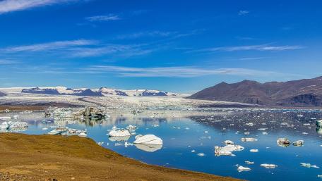 Majestic Glacier Landscape Under Clear Blue Skies wallpaper