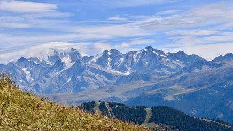 Majestic Mountain Landscape Under Clear Blue Skies wallpaper