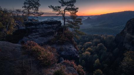 Majestic Sunset Over Serene Mountain Landscape wallpaper