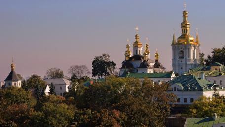 Golden Spires of a Historic Cityscape wallpaper
