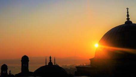 Golden Sunset Over City Silhouettes wallpaper