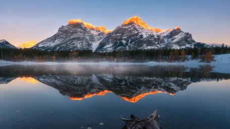 Serene Winter Reflections in Mountain Landscape wallpaper