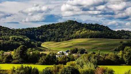 Serene Hills Under a Dramatic Sky wallpaper