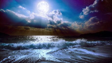 Ethereal Moonlight Over Ocean Waves wallpaper