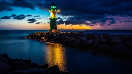 Stunning Evening Lighthouse Reflection wallpaper