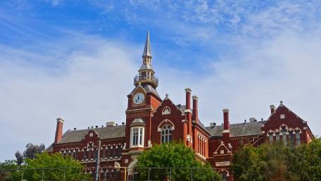 Historic City Architecture Under Clear Blue Sky wallpaper