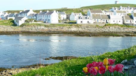 Serene Coastal Village by the Water wallpaper