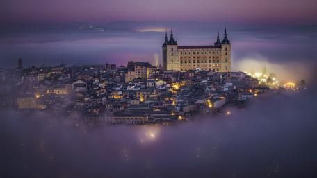 Mysterious Purple Cityscape at Dusk wallpaper