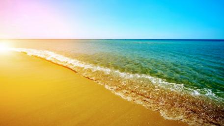 Serene Sandy Beach at Dusk wallpaper