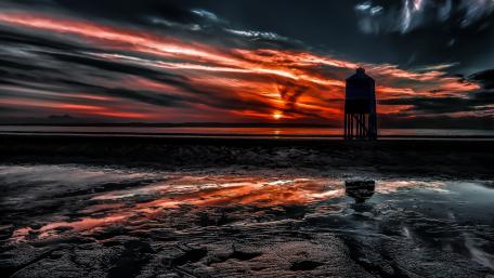 Breathtaking Sunset Over Tranquil Shores wallpaper