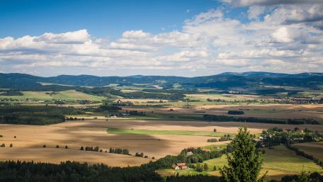 Rolling Hills and Expansive Fields Panorama wallpaper