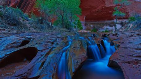 Serenity of a Hidden Waterfall Scene wallpaper