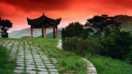 Vivid Sunset Over Serene Landscape wallpaper
