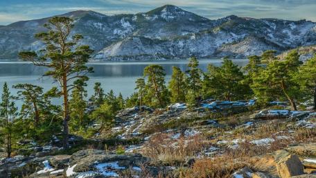 Serenity in Nature's Embrace Above the Lake wallpaper