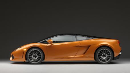 Sleek Orange Sports Car Design wallpaper