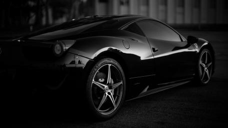 Sleek Black Sports Car Wallpaper wallpaper