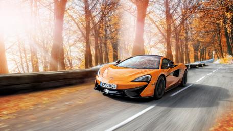 Autumn Adventure with a McLaren Car on the Road wallpaper