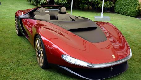Sleek Red Ferrari Concept Car Wallpaper wallpaper
