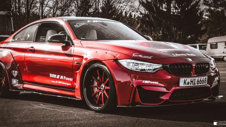 Sleek Red BMW M4 in Stunning Detail wallpaper