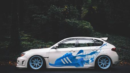 Stylish Car with Unique Sneaker Art Design wallpaper