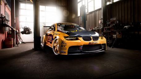 Striking BMW in a Custom Garage Setting wallpaper