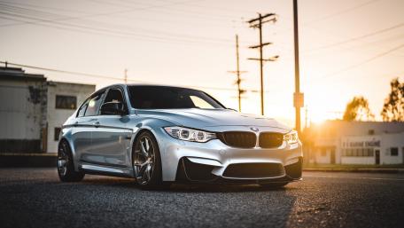 Sleek Silver BMW at Sunset wallpaper
