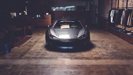 Sleek Sports Car in Urban Setting wallpaper