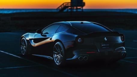 Sleek Ferrari at Sunset Glow wallpaper