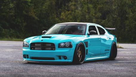 Vibrant Blue Muscle Car Wallpaper wallpaper