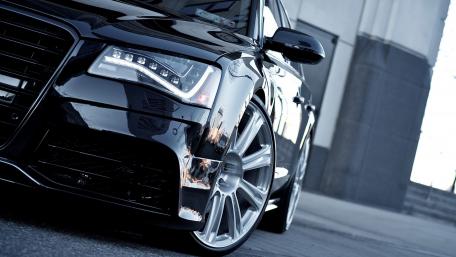 Sleek Elegance of a Black Luxury Car wallpaper