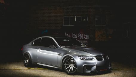 Sleek Silver BMW M4 in Urban Setting wallpaper