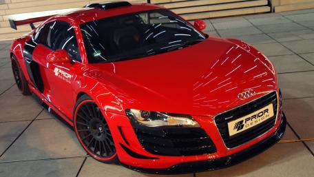 Sleek Red Audi R8 in Urban Setting wallpaper
