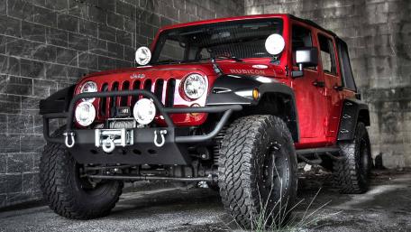 Bold Red Jeep Rubicon on Display wallpaper