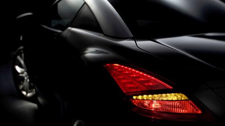 Sleek Elegance of a Black Sports Car wallpaper