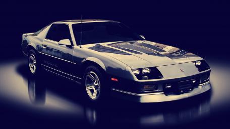Vintage Sleek Powerhouse Car Wallpaper Displaying Classic Elegance wallpaper