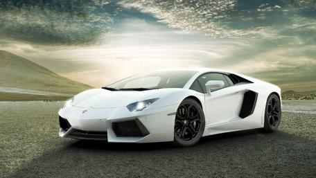 Sleek White Lamborghini on a Desert Landscape wallpaper