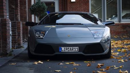 Sleek Lamborghini Roaring Into Autumn Vibes wallpaper