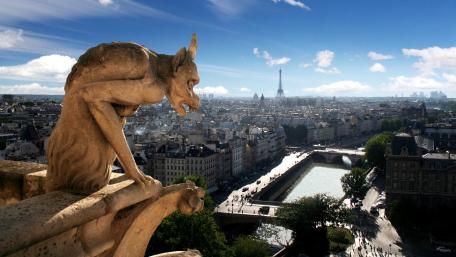 Gargoyle Overlooking Paris Skyline wallpaper