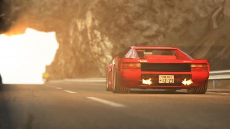 Classic Red Turbo Car on Scenic Mountain Road wallpaper
