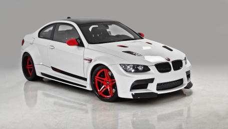 Sleek Red and White Performance Car Wallpaper wallpaper