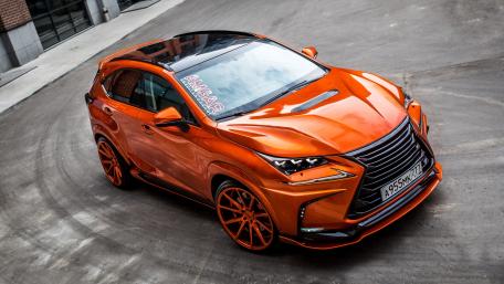 Stunning Orange SUV with Custom Rims and Shine wallpaper