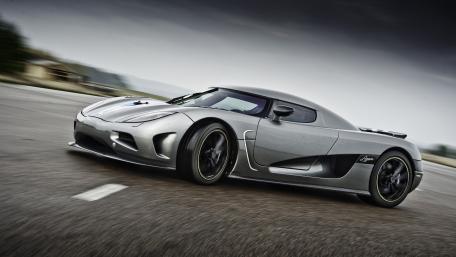 Sleek Silver Hypercar in Motion wallpaper