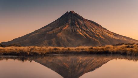 Majestic Volcanic Reflection at Dawn wallpaper